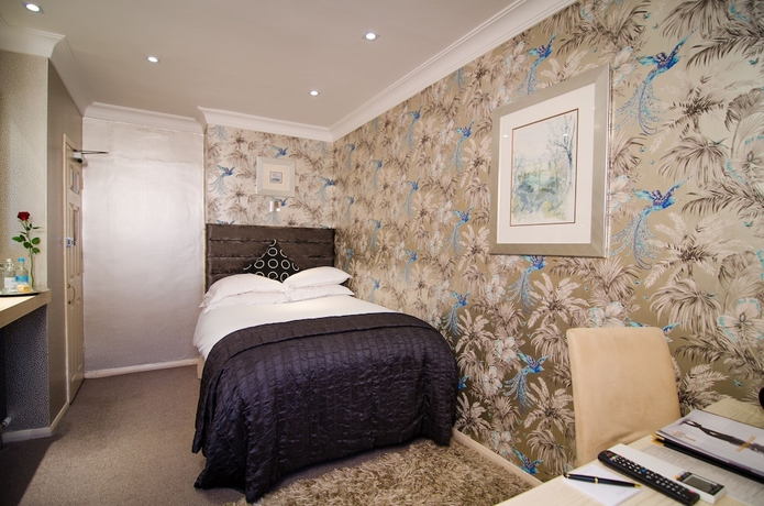 Imagen de la habitación del Hotel The Beaufort Knightsbridge. Foto 6