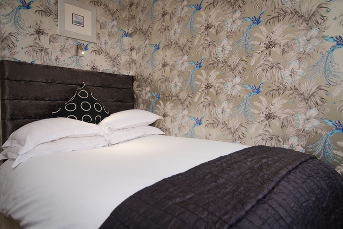 Imagen de la habitación del Hotel The Beaufort Knightsbridge. Foto 11