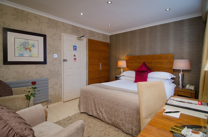 Imagen de la habitación del Hotel The Beaufort Knightsbridge. Foto 13