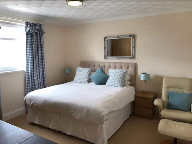 Imagen de la habitación del Hotel The Beaufort Raglan. Foto 12