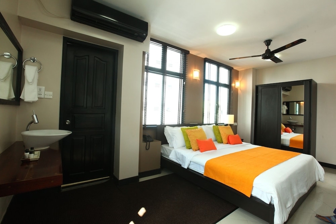 Imagen de la habitación del Hotel The Beehive. Foto 15