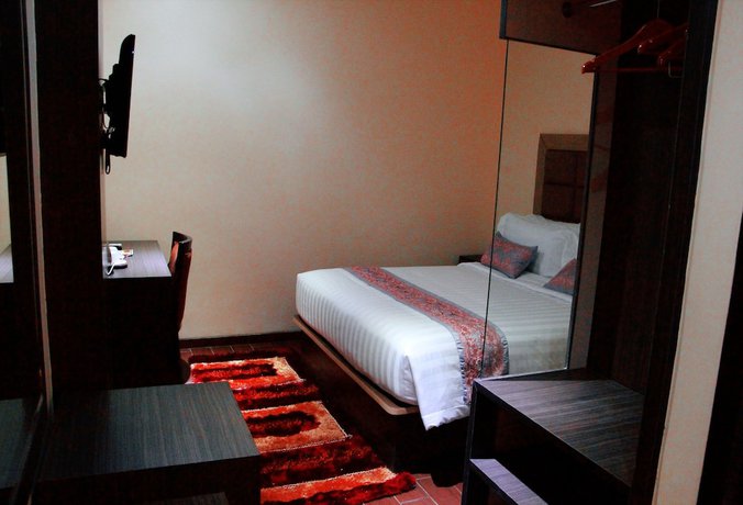 Imagen de la habitación del Hotel The Belagri and Convention. Foto 2