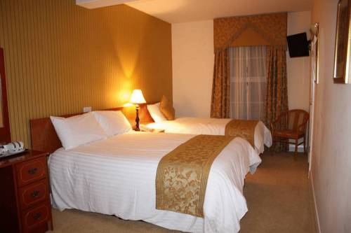 Imagen de la habitación del Hotel The Belfray Country Inn. Foto 2