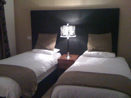 Imagen de la habitación del Hotel The Belfray Country Inn. Foto 3