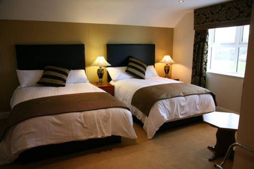 Imagen de la habitación del Hotel The Belfray Country Inn. Foto 4