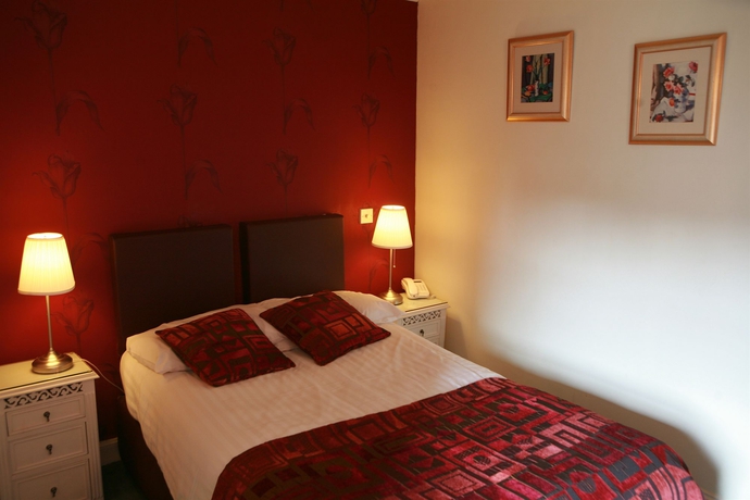 Imagen de la habitación del Hotel The Belhaven. Foto 7