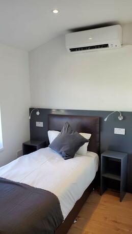 Imagen de la habitación del Hotel The Bell Gate House. Foto 17