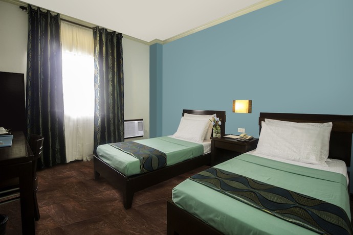 Imagen de la habitación del Hotel The Bell Hotel. Foto 10