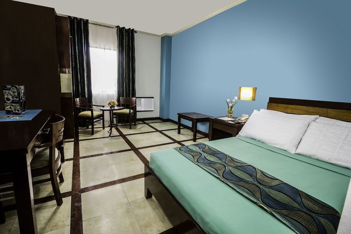 Imagen de la habitación del Hotel The Bell Hotel. Foto 13