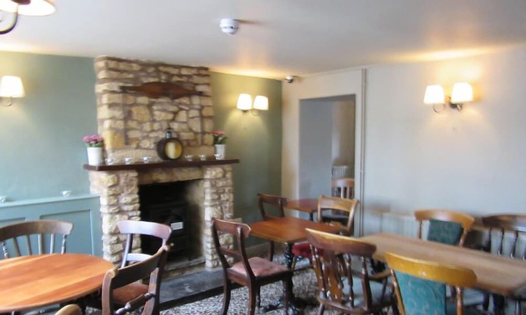 Imagen del bar/restaurante del Hotel The Bell Inn, Moreton-in-Marsh. Foto 7