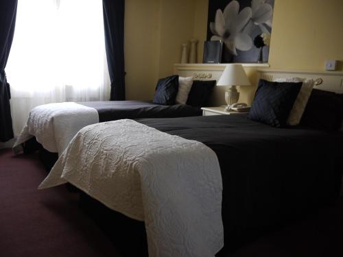 Imagen de la habitación del Hotel The Bell, Winslow. Foto 5