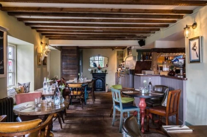 Imagen del bar/restaurante del Hotel The Bell at Stow. Foto 6