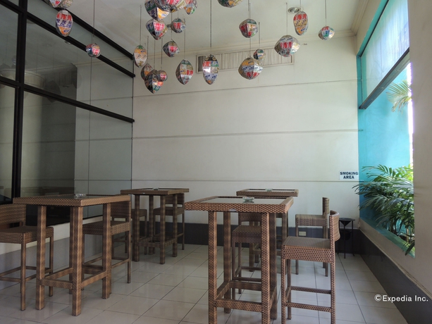 Imagen del bar/restaurante del Hotel The Bellavista. Foto 6