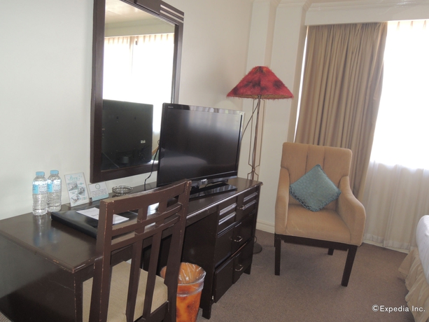 Imagen de la habitación del Hotel The Bellavista. Foto 7