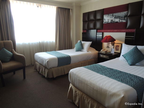 Imagen de la habitación del Hotel The Bellavista. Foto 8