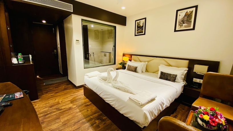 Imagen de la habitación del Hotel The Bellevue, Indore. Foto 5
