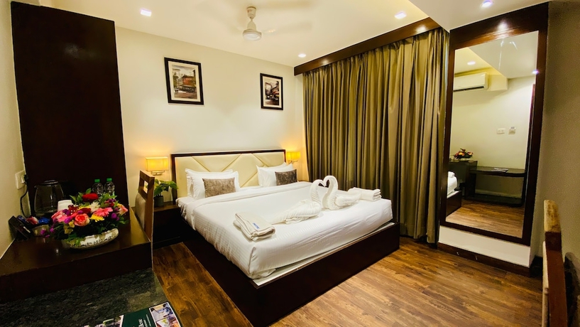 Imagen de la habitación del Hotel The Bellevue, Indore. Foto 6