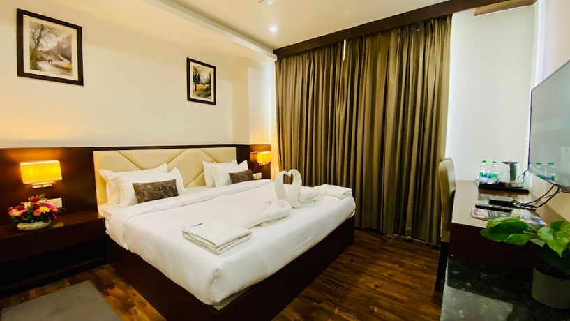 Imagen de la habitación del Hotel The Bellevue, Indore. Foto 7