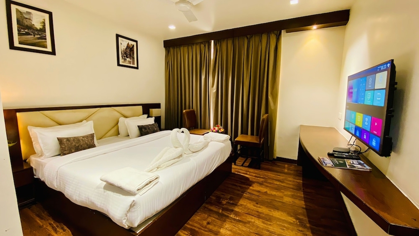 Imagen de la habitación del Hotel The Bellevue, Indore. Foto 8