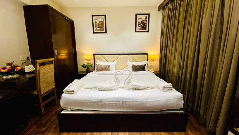 Imagen de la habitación del Hotel The Bellevue, Indore. Foto 9