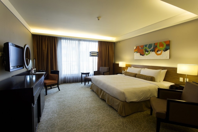 Imagen de la habitación del Hotel The Bellevue Manila. Foto 4