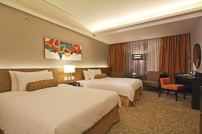 Imagen de la habitación del Hotel The Bellevue Manila. Foto 8