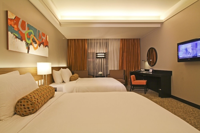 Imagen de la habitación del Hotel The Bellevue Manila. Foto 9