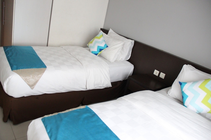 Imagen de la habitación del Hotel The Bellezza Suites Jakarta. Foto 10
