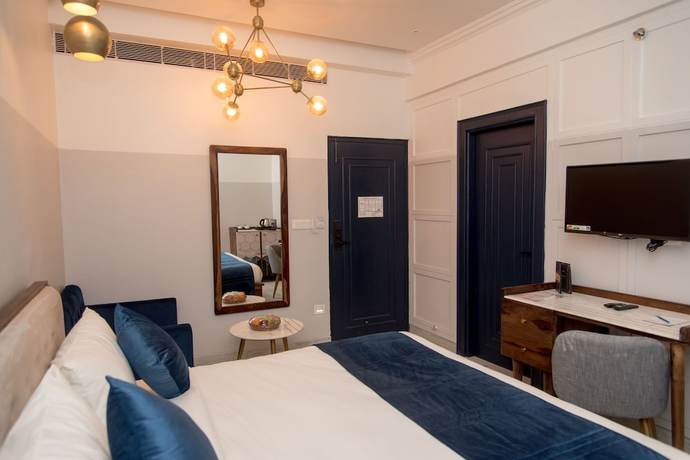 Imagen de la habitación del Hotel The Belmonte House. Foto 3