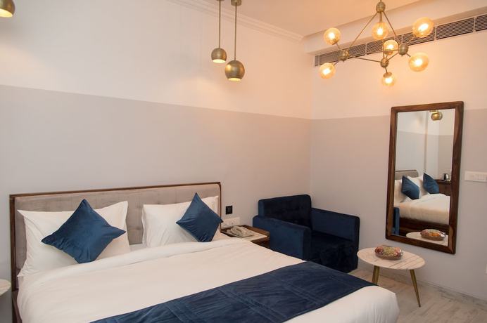 Imagen de la habitación del Hotel The Belmonte House. Foto 4