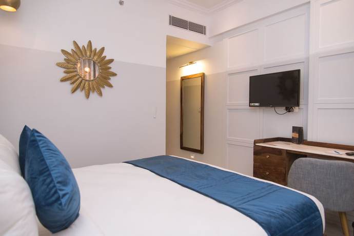Imagen de la habitación del Hotel The Belmonte House. Foto 10