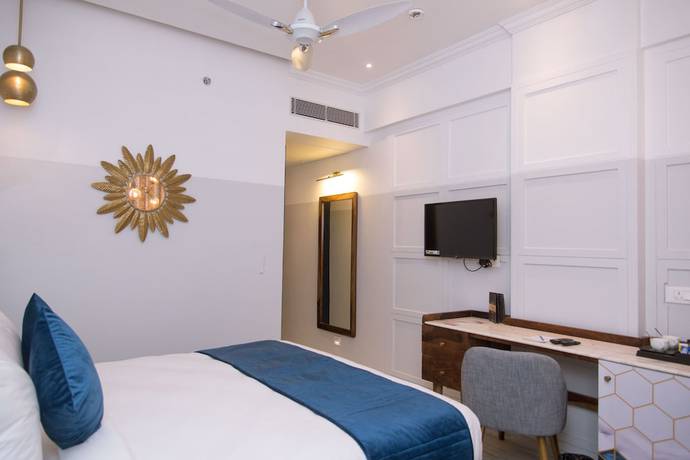 Imagen de la habitación del Hotel The Belmonte House. Foto 16