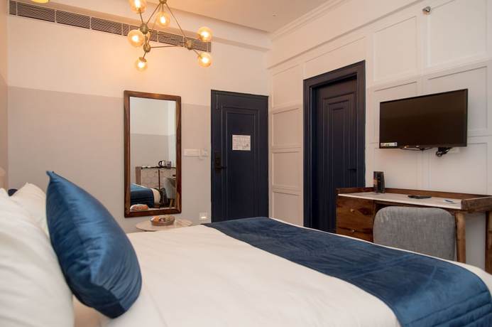 Imagen de la habitación del Hotel The Belmonte House. Foto 17