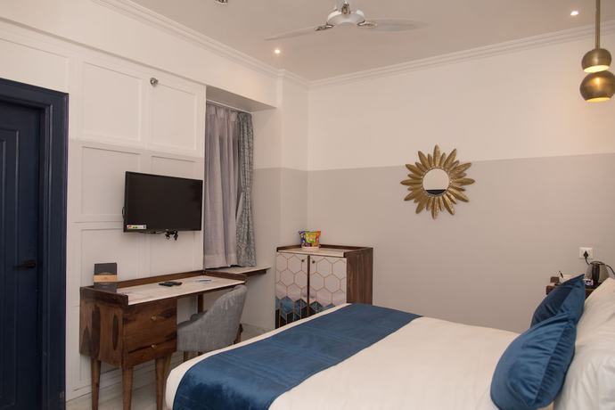 Imagen de la habitación del Hotel The Belmonte House. Foto 18