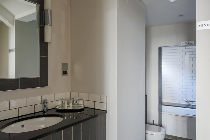 Imagen de la habitación del Hotel The Belsfield. Foto 15