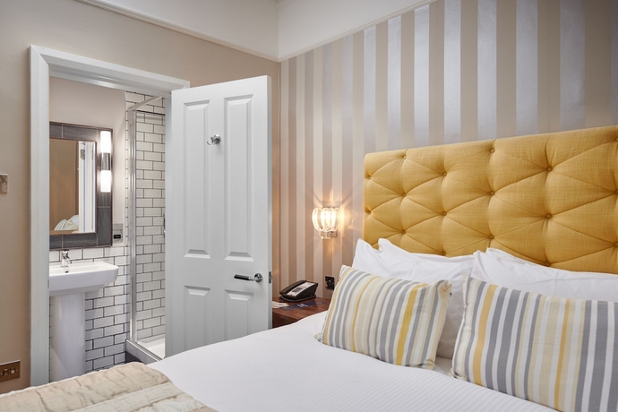 Imagen de la habitación del Hotel The Belsfield. Foto 16