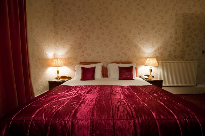 Imagen de la habitación del Hotel The Ben Doran. Foto 9