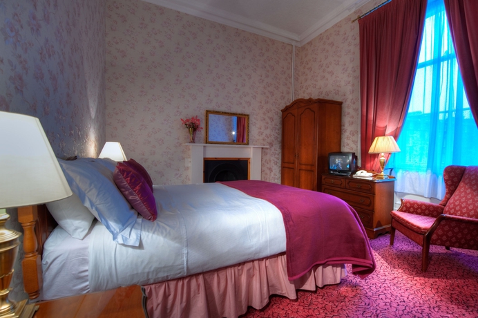 Imagen de la habitación del Hotel The Ben Doran. Foto 11