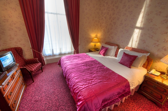 Imagen de la habitación del Hotel The Ben Doran. Foto 13