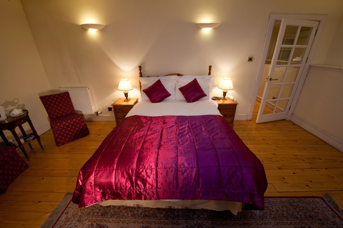 Imagen de la habitación del Hotel The Ben Doran. Foto 14