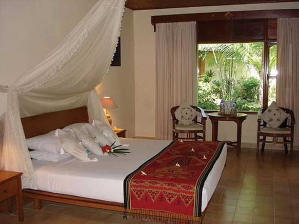 Imagen de la habitación del Hotel The Benoa Beach Front Villas and Spa. Foto 5