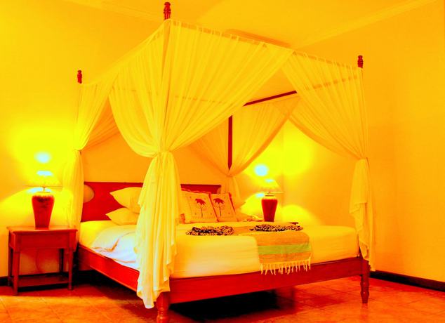 Imagen de la habitación del Hotel The Benoa Beach Front Villas and Spa. Foto 8
