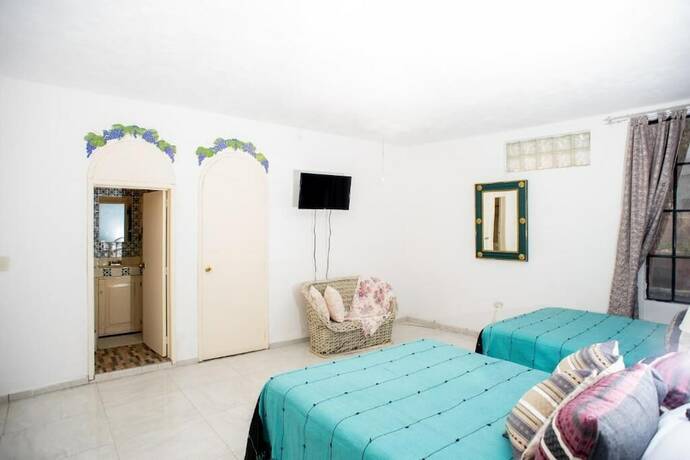 Imagen de la habitación del Hotel The Bersal House. Foto 16