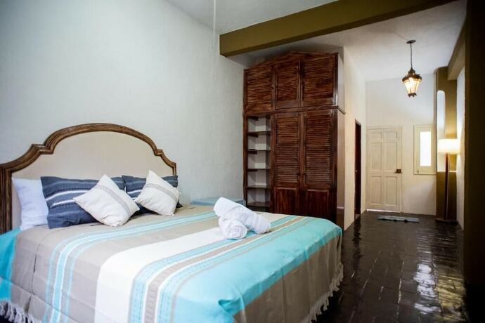 Imagen de la habitación del Hotel The Bersal House. Foto 18