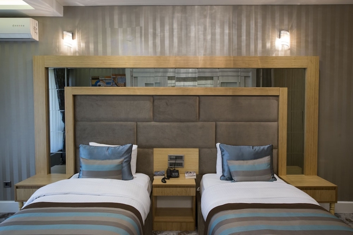 Imagen de la habitación del Hotel The Berussa. Foto 11