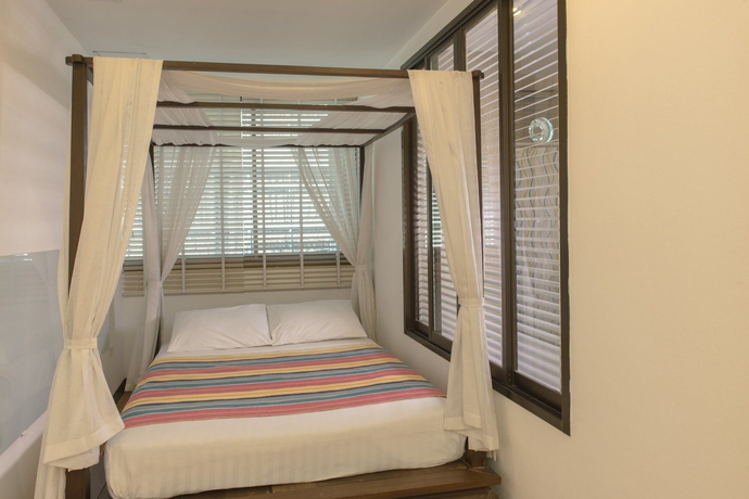 Imagen de la habitación del Hotel The Best Bangkok House. Foto 4