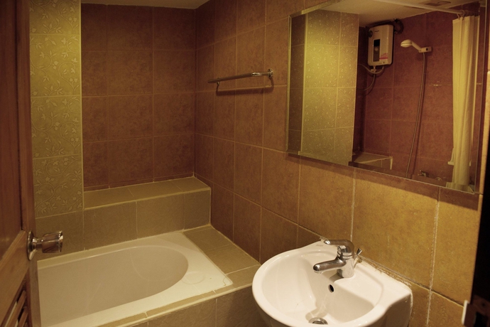 Imagen de la habitación del Hotel The Best Bangkok House. Foto 8
