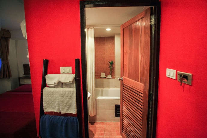 Imagen de la habitación del Hotel The Best Bangkok House. Foto 12