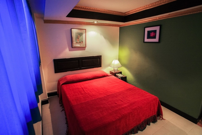 Imagen de la habitación del Hotel The Best Bangkok House. Foto 13