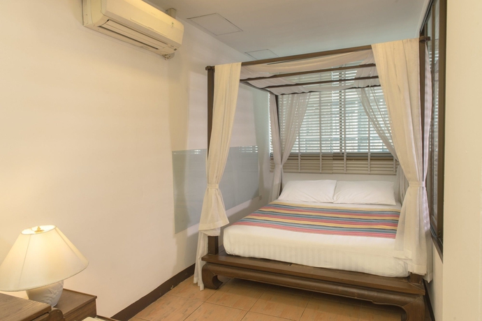 Imagen de la habitación del Hotel The Best Bangkok House. Foto 14